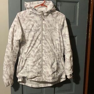 New balance size medium gray and white camo colored light jacket.